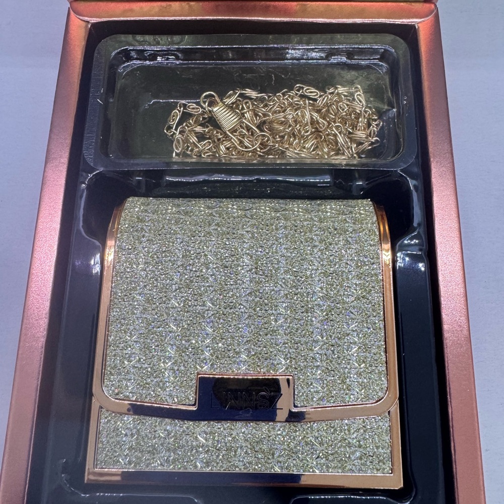 Velvet Matte lipstick set in a silvery chain bag